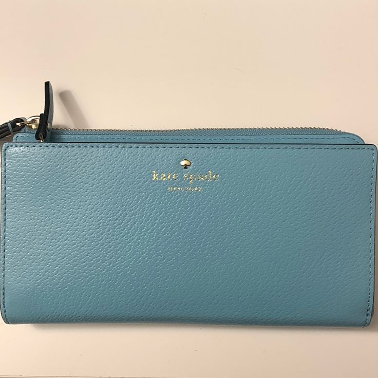 Kate Spade Blue Clutch New - With Tags Brand New Blue Kate Spade Clutch/Wallet! Great Condition & Perfect For A Night Out!! Kate Spade Blue Travel Wallet, Kate Spade Clutch, Blue Clutch, Bags Kate Spade, Kate Spade Bags, Kate Spade Bag, Clutch Wallet, Wallets, Night Out