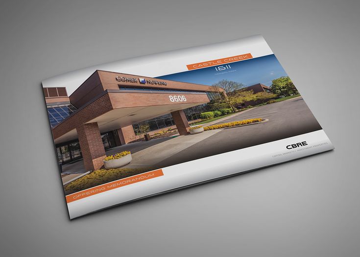 a brochure is displayed on the front cover of a business building with an orange and white design