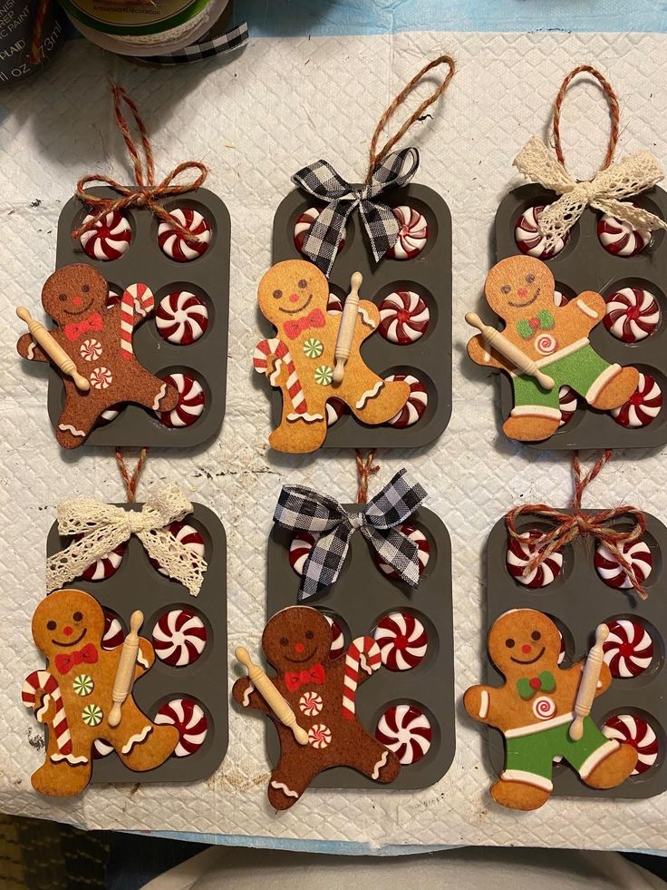 six gingerbread christmas ornament hanging on a table