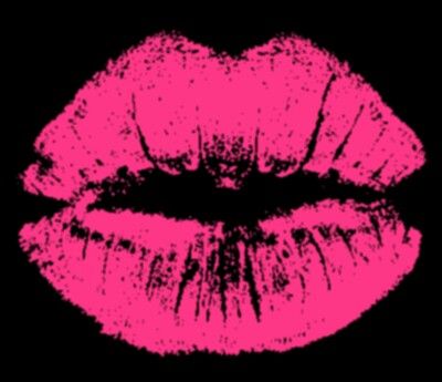 a pink lipstick on a black background