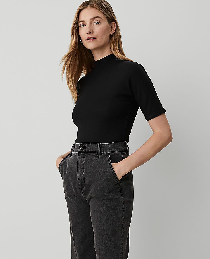 An everyday style essential, our mock neck elbow sleeve top keeps you polished through the season. Mock neck. Elbow sleeves.,Hit:Hits at hip,Imported:Imported,Fit:Soft & stretchy fit,Length:23 1/2" long,Fabrication:89% Cotton, 11% Spandex,Garment Care:Machine Washable Mock Neck Elbow Sleeve Top by Ann Taylor Size regular - 2XL Black Women's Cotton, Blend, Mock, Neck, Short, Sleeve, Knits, Tops, 89%, Cotton, 11%, Spandex, Machine, Washable Fitted Ribbed Mock Neck Top For Workwear, Solid High Neck Top With Ribbed Collar, Versatile Fitted Mock Neck Top, Fitted Black Mock Neck Top In Elastane, Versatile Fitted Black Mock Neck Top, Short Sleeve Turtleneck, Mock Neck Short Sleeve, Fashion Journal, Fashion Journals