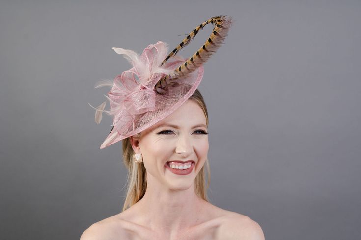 Sinamay Fascinator with feathers and satin headband is perfect for the Kentucky Derby, Easter, Mother's Day Tea, High Tea, Wedding, or any special occasion. ♥Attaches with matching, satin headband. ♥Ultra Light & comfortable to wear.♥Packed and shipped in a sturdy box with special love & care to ensure a safe delivery.♥Includes a hat care card with instructions on how to care for & keep your piece beautiful.♥Over 14,000 pieces sold & 2,000 5 star reviews. Our "Hive Girls" come back year after ye Pink Ostrich Feather Fascinator, Pink Ostrich Feather Fascinator For Royal Ascot, Fitted Pink Fascinator With Feather Trim, Fitted Pink Mini Hat With Feather Trim, Pink Feathered Fascinator For Races, Adjustable Pink Feathered Fascinator, Pink Feather Fascinator For Royal Ascot, Ostrich Feather Fascinator For Races, Adjustable Pink Fascinator With Feathers