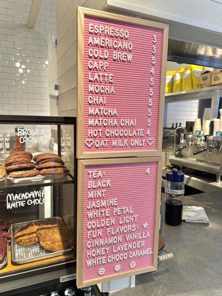 a display case in a bakery filled with pastries