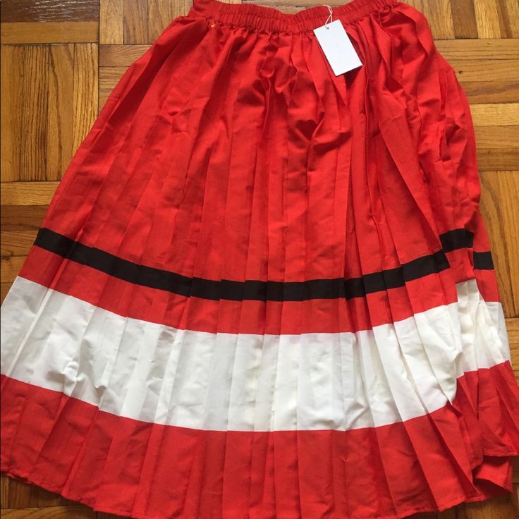 She Is A Pretty Long Pleated Skirt From A Niche Brand So You Will Be Donning Something Unique Almost Like Made-To-Order . Behold Her Beauty & If You Can't Resist No More Bc U R Lucky Enough To Fit In It (I M Now Kinda Not), Then Pls Initiate Offer N Pls Note That Price Is Mildly Firm. Colour Is A Red Orangish Hue - Lovely!!! Red Long Pleated Skirt For Spring, Red Flared Pleated Skirt For Summer, Casual Red Pleated Full Skirt, Casual Red Full Pleated Skirt, Red Mini Pleated Skirt For Summer, Red Midi Pleated Skirt For Summer, Red Mini Pleated Skirt For Spring, Red Pleated Mini Skirt For Spring, Red Pleated Flared Skirt For Spring