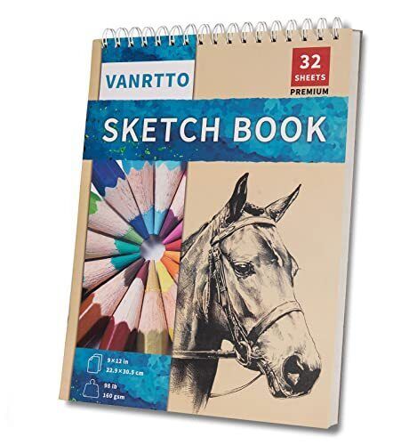 a sketch book with an image of a horse and pencils on the front cover