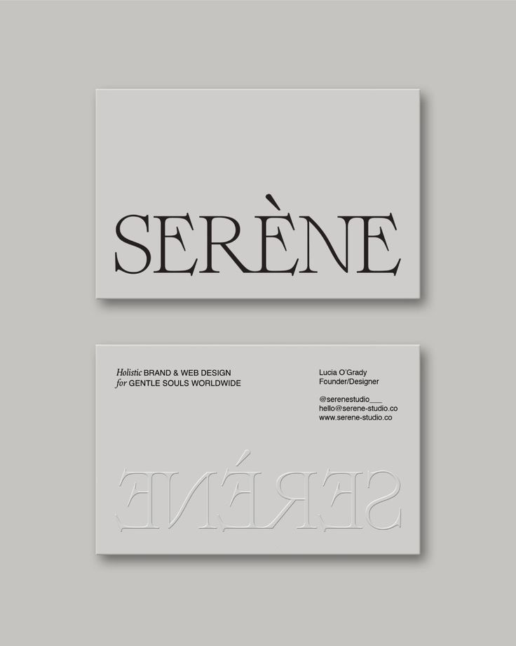 two business cards with black and white lettering on them, one has the word serene in