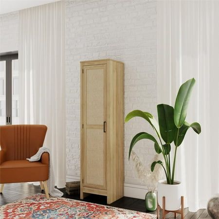 a living room with white brick walls and wooden furniture, including a brown arm chair