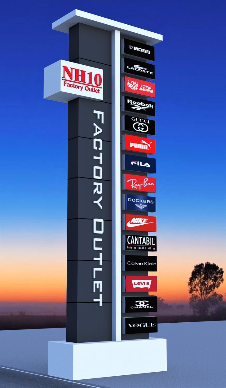 a tall sign with many different logos on it