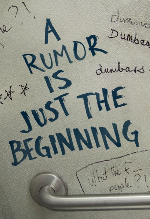 graffiti on the side of a refrigerator door that says, a rumor is just the beginning