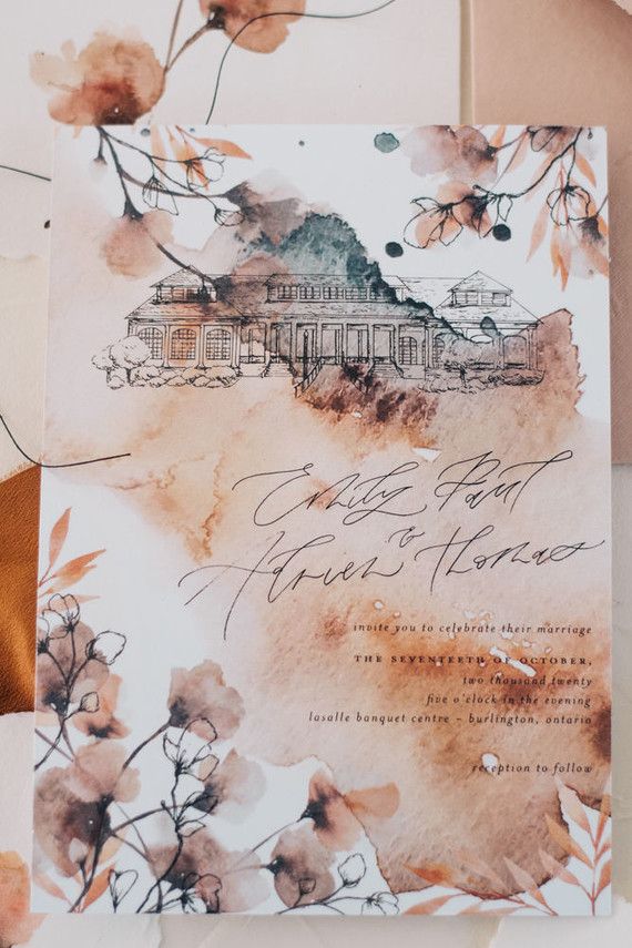 the wedding stationery is decorated with watercolors and paper flowers, such as roses