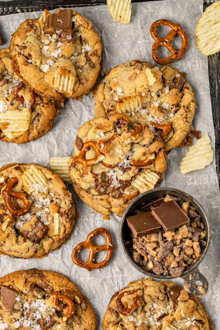 cookies, pretzels and other snacks are on the table