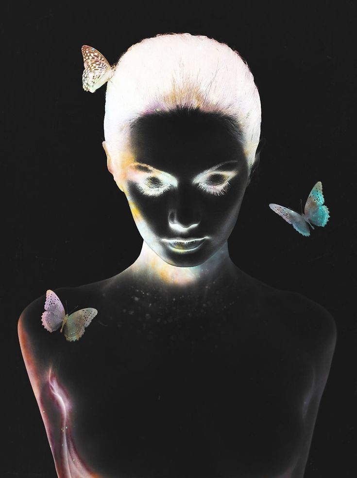 a woman with white hair and butterflies on her face is shown in black art print