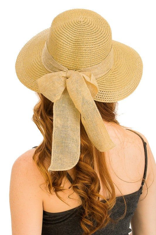 You can customize the hat to your own name. Made in USA. Sunny breezy visor styled female sun hat with neutral toned band standard size. High quality. Brim is about 4.5 inches CARE INSTRUCTIONS: Do not get your straw hat wet! This will cause the straw to swell and lose its shape. Always handle your hat by its brim. Floppy Sun Hats, Sun Hat, Straw Hat, Sun Hats, Made In Usa, Care Instructions, Straw, Finding Yourself, Sun