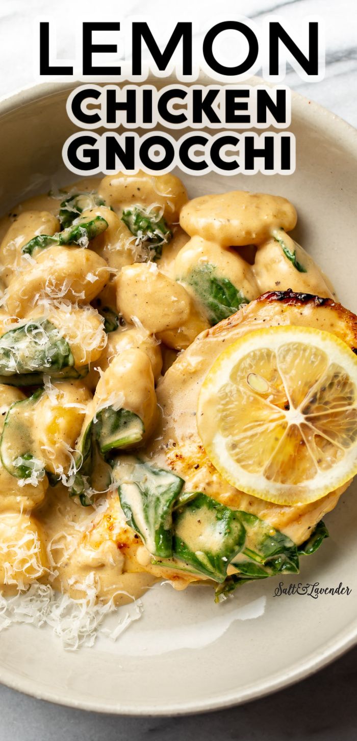 lemon chicken gnocchi with spinach and parmesan cheese in a white bowl