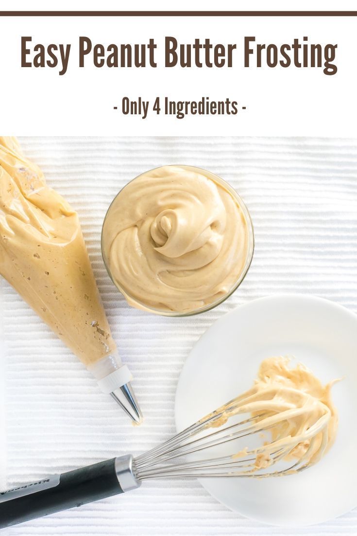 peanut butter frosting on a white plate next to a whisk and spoon