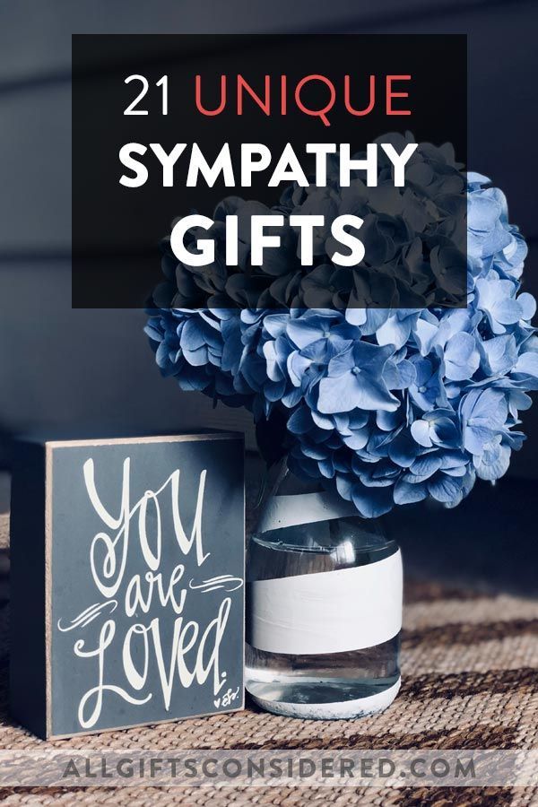 blue hydrant in a vase with the words unique sympathy gifts on it next to a card