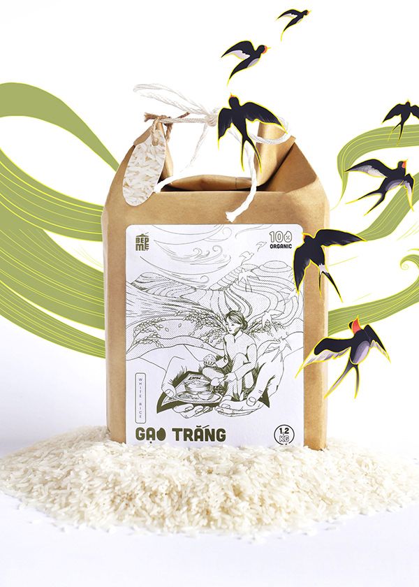 a bag of rice sitting on top of a table next to birds flying over it