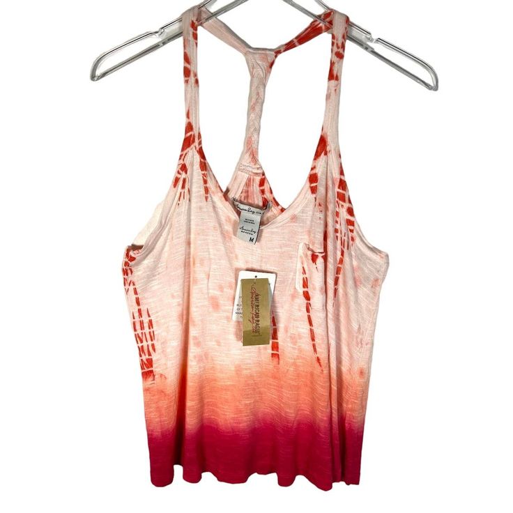 New! American Rag Women's Sleeveless Tank Top M Red Orange Tie Dye Scoop Neck Color: Rouge Red Combo Pullover Style, Braided Back Strap, Beach, Classic, Casual, Colorful, Lightweight. Slub Knit. Condition: New With Tag. No Flaws! Size: Medium Underarm-To-Underarm: 18" Length: 22" Material: 100% Viscose Red Cotton Tops With Tank Straps, Red Cotton Tank Camisole, Stretch Racerback Vest For Summer, Red Cotton Cami Tank Top, Red Stretch Tank Top For Vacation, Casual Red Tank Strap Tops, Red Sleeveless Camisole For The Beach, Red Cotton Camisole For Summer, Spring Racerback Tank Top