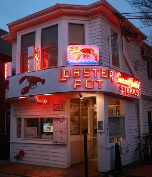 the lobster pot is lit up at night