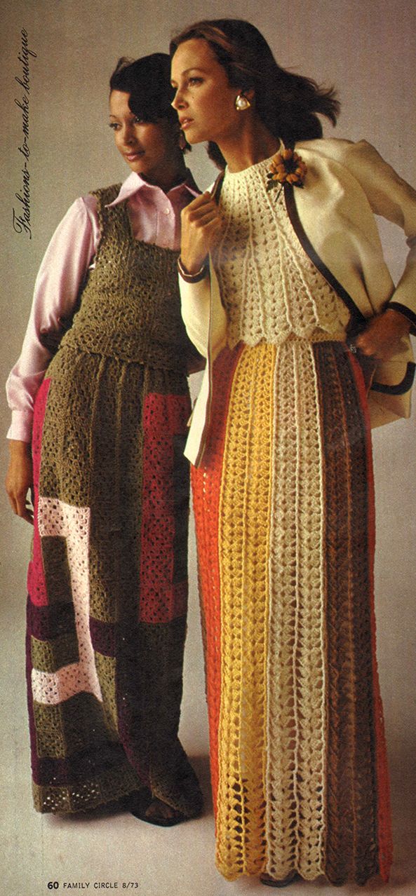 two women standing next to each other in crocheted dresses and jackets, one wearing a pink shirt