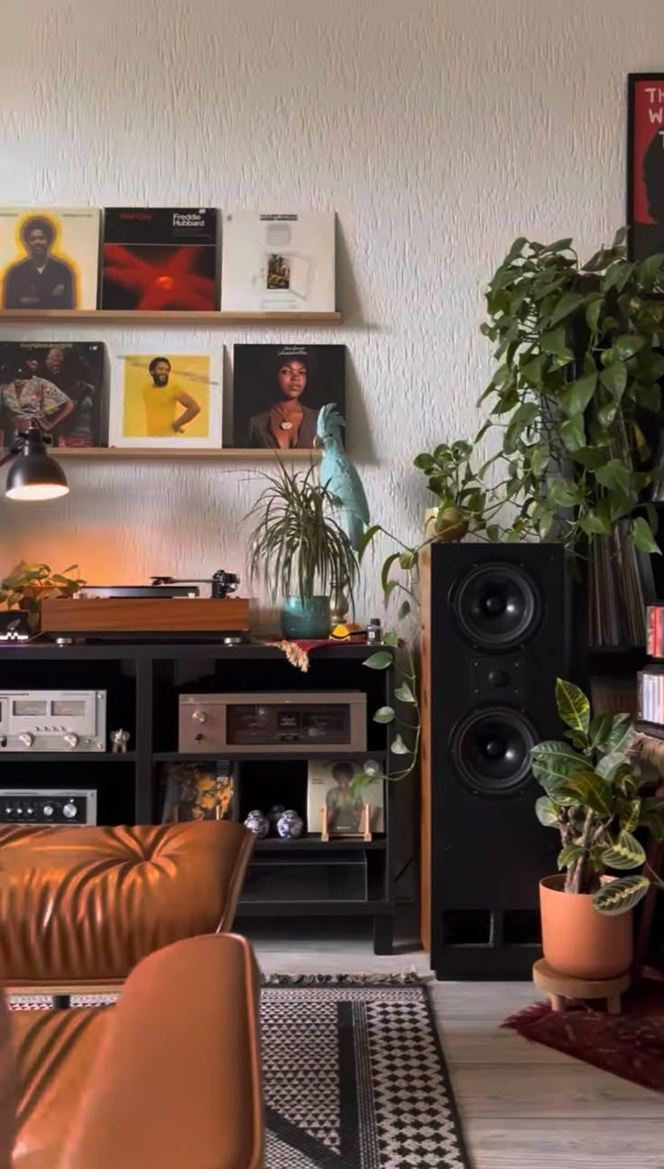 a living room filled with furniture and lots of plants