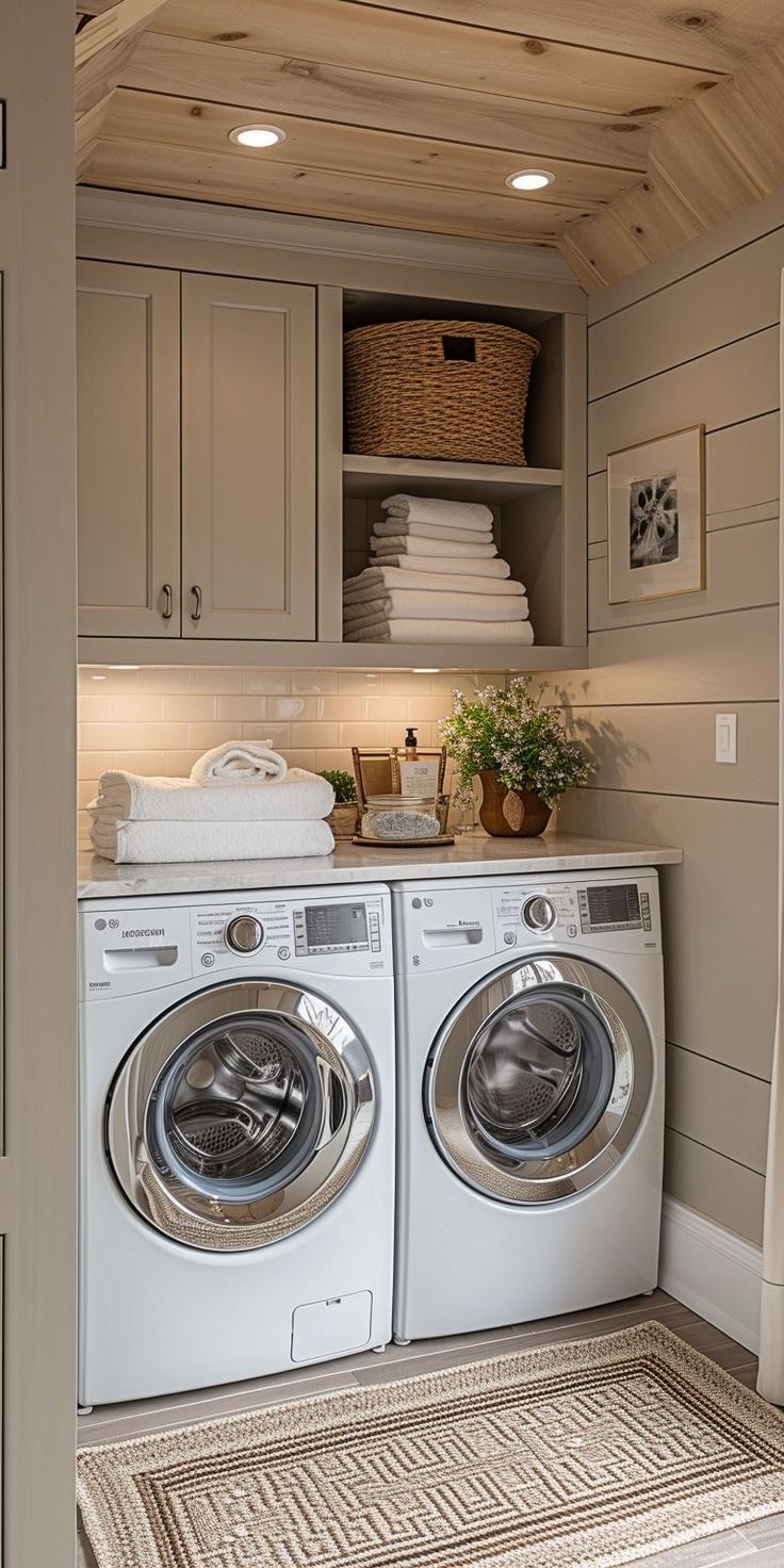 a washer and dryer in a small room