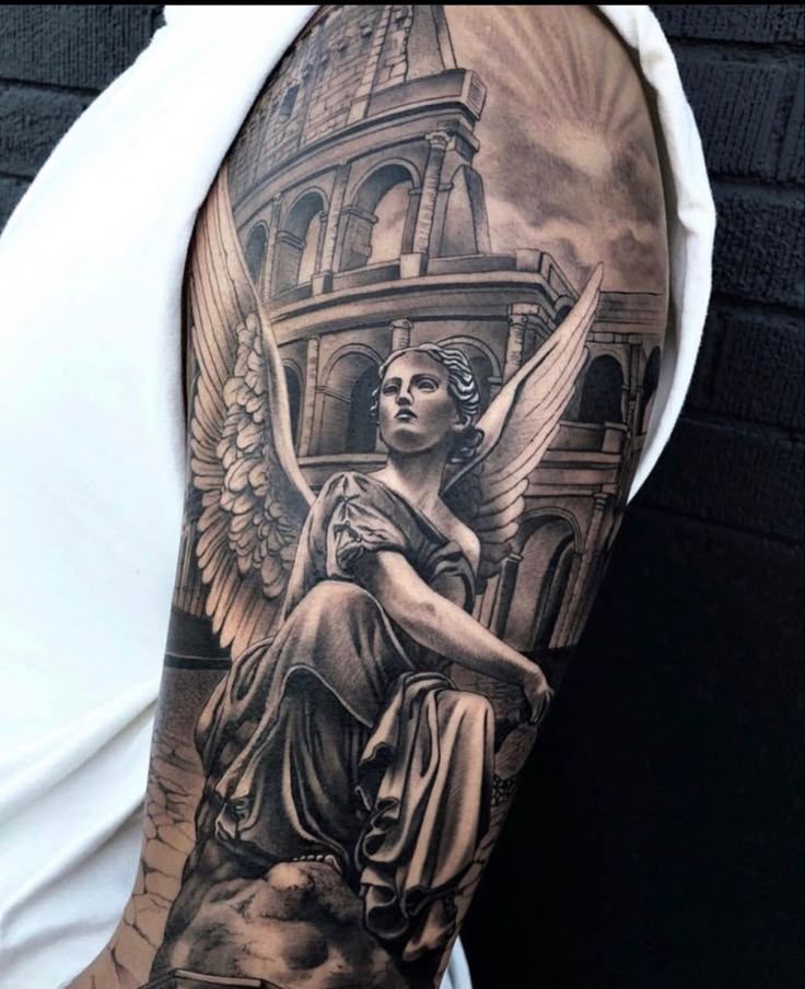 a man's arm with an angel on it and a building in the background