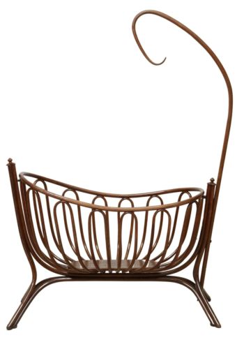 a metal basket with curved handles on it