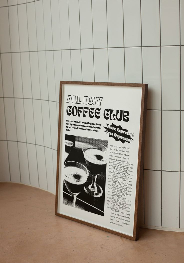 an all day coffee club sign in front of a tiled wall