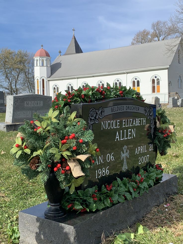 a wreath is placed on the grave of nicole elizabeth allen, who was murdered in 1876