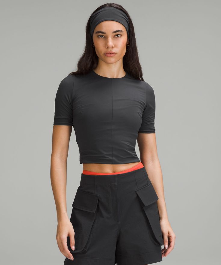 This not-so-basic base layer is made to move with you. Layer it up or show it off-either way, it's fully lined for max coverage and all-day comfort. Designed for Casual. Contours your body:Not too short, not too long, just right around the waistband. Versatile Lululemon Tops For Spring, Stretchy Lululemon Crew Neck Top, Lululemon Stretch Crew Neck Top, Lululemon Stretch T-shirt With Short Sleeves, Lululemon Stretch Short Sleeve T-shirt, Lululemon Athleisure Tops For Spring, Casual Stretch Tops By Lululemon, Lululemon Stretch Crew Neck T-shirt, Lululemon Summer Athleisure Tops