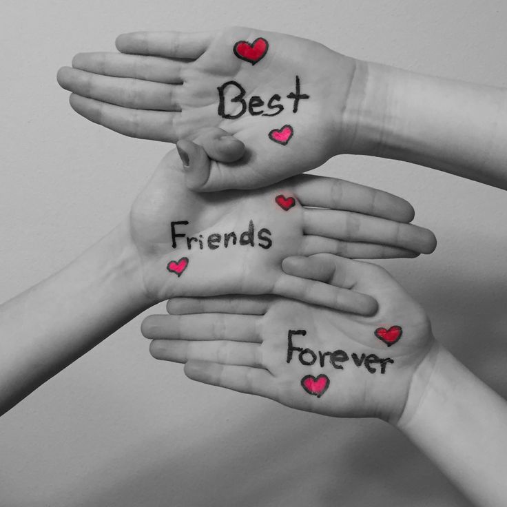 four hands with the words best friends written on their palms and hearts drawn on them