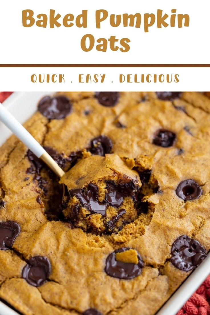 baked pumpkin oats in a square white dish with a spoon sticking out of it