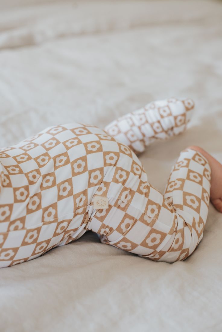 Introducing our elevated BAMBOO ZIPPER PAJAMAS for your little ones! Crafted ethically in a timeless yet modern style, these pajamas offer both style and comfort all day long! Features: 94% Viscose from Bamboo, 6% Spandex, for a soft and stretchy feel Two-way zipper to make late night diaper changes and mid day wardrobe changes effortless Rollover cuffs on hands to prevent those tiny nails from scratching The option to go footless or footed Why Bamboo? It's soft, breathable, temp-regulating, hyp Bamboo Baby Clothes, Bamboo Onesie, Tiny Nails, Baby Bamboo, Late Night Diapers, Bamboo Pajamas, Baby Pajamas, Baby Skin, Baby & Toddler Clothing