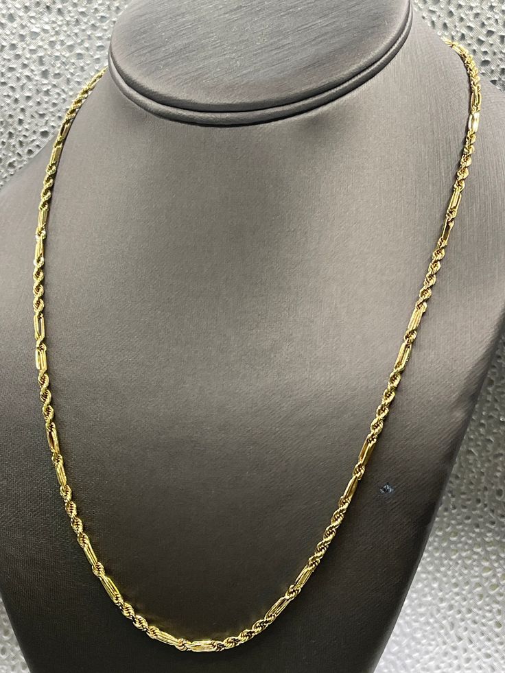 "Designed, manufactured and imported from Italy, this fabulous chain is made from 14 karat solid yellow gold. The combination of the Figero link and the solid diamond cut rope has always been a popular chain.  Strong and heavy in gold, this chain is perfect to wear everyday!   Woman or man, it looks great on! Weight-13.3 grams Length-20\" Thickness-2.8mm .   Our Price $1449.00 Regularly Priced At $2100.00 Please See Our Video Remember - If you're purchasing for yourself or a gift for a loved one, buy with confidence.  We Guarantee Everything We Sell!  SKU # C249" Elegant Gold Diamond-cut Rope Chain Necklace, Elegant Gold Diamond Cut Rope Chain Necklace, Luxury 14k Gold Rope Chain Necklace, Formal Yellow Gold Rope Chain Necklace, Formal Rope Chain Necklace, 14k Gold Rope Chain Luxury Necklace, 14k Gold Link Rope Chain Necklace, Formal Gold Rope Chain Link Necklace, Formal 14k Gold Rope Chain Necklace