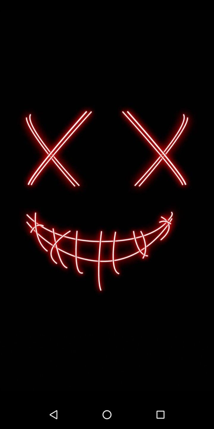 an image of a scary face with red lights