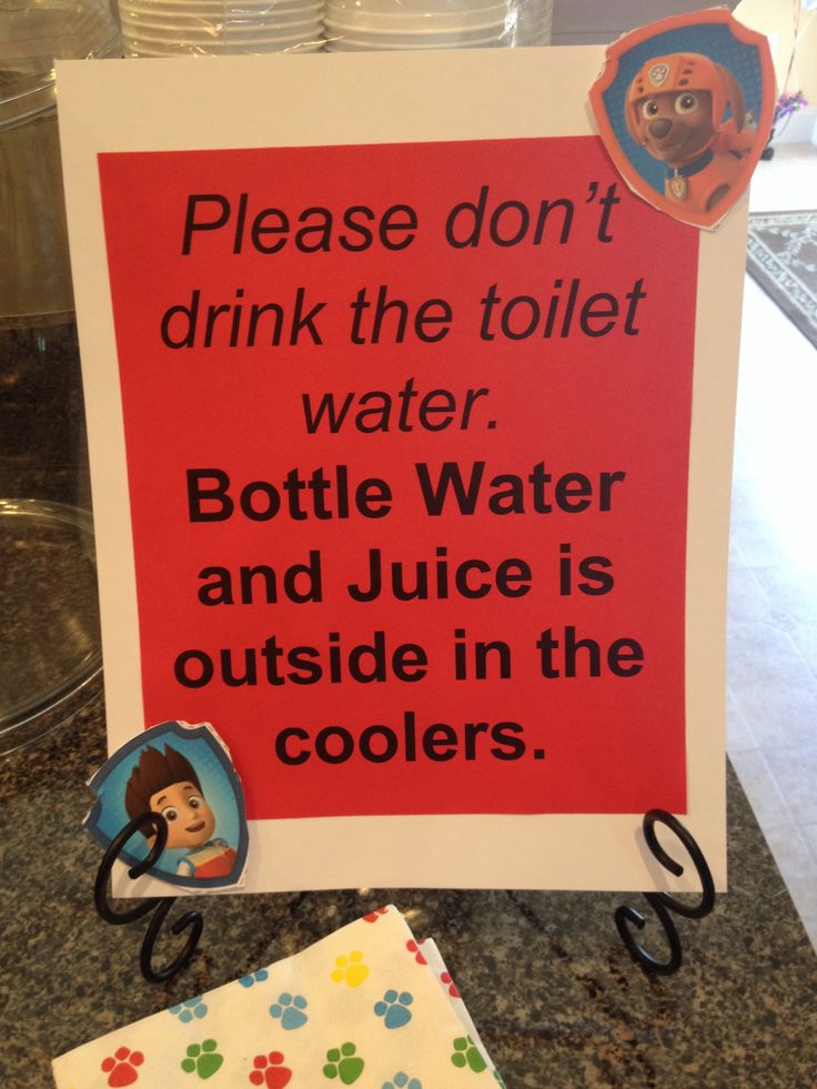 a sign that says please don't drink the toilet water bottle water and juice is outside in the coolers