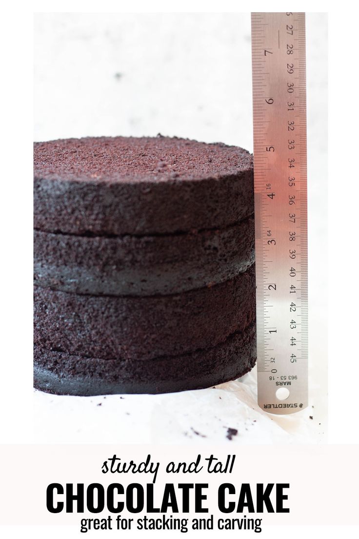 a chocolate cake next to a measuring tape with the words study and fall chocolate cake great for stacking and carving