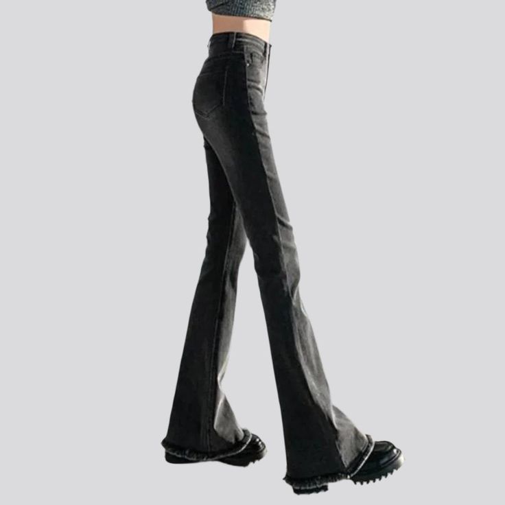 Introducing our laid-back style rock-washed jeans for women from the 2023 Autumn Collection a modern design with retro flairs that nods to the past while keeping up with today's couture trends!Why You'll Love ItPatterned with the modern-forward woman in mind. these jeans promise to bring out your inner fashionista. The quintessential elevated-waist design. combined with a zipper & button closure. ensures all-day comfort and a perfect cut. The pebble-washed finish gives it a unique texture that s Trendy Fall Flare Jeans With Frayed Hem, Trendy Cotton Flares With Frayed Hem, High Rise Grunge Flare Jeans For Fall, Casual Cotton Flares With Frayed Hem, Flared Jeans With Five Pockets For Streetwear, Fitted Washed Black Denim Flare Jeans, Trendy Stretch Flares With Frayed Hem, Fall Grunge Flare Jeans, Retro High Rise Flare Jeans With Frayed Hem