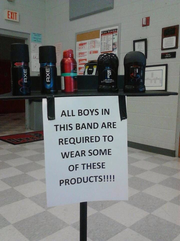 a sign that says all boys in this band are required to wear some of these products