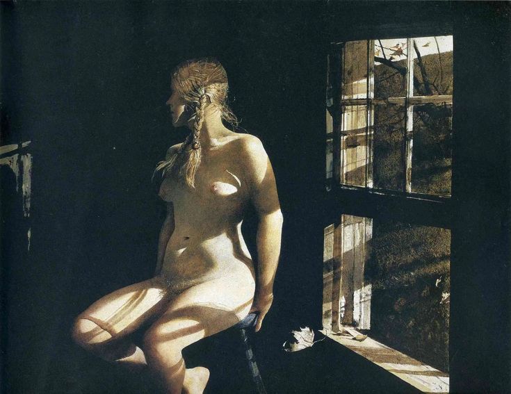 a naked woman sitting in front of a window