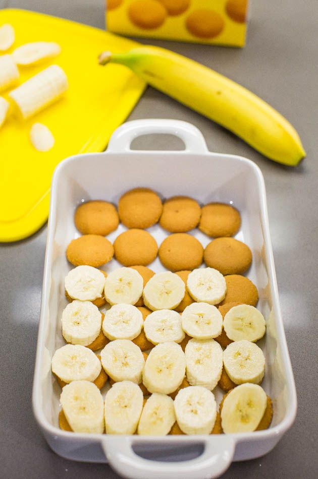 banana slices and cookies in a container on a table