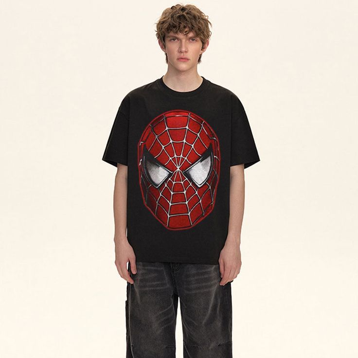 **Fire designs with luxury blanks, Only at aoklok graphic brand. Unleash your inner superhero with the AG® Great Power Spider-Man T-shirt! Made with premium materials, this shirt features a bold graphic of Spider-Man unleashing his powers. Perfect for casual wear or a costume, it's a must-have for any fan of the web-slinging hero. Features: -100% Cotton -Crew Neckline -Super Soft Fabric -Loose -Solid Color -Regular fit -Urban style Casual Graphic T-shirt For Fan Conventions, Superhero Graphic T-shirt With Short Sleeves, Superhero Graphic Print Short Sleeve T-shirt, Black Fan Apparel T-shirt With Graphic Design, Urban Black T-shirt For Halloween, Black Tops With Screen Print For Fan Conventions, Black Screen Print Tops For Fan Conventions, Black Hip Hop T-shirt For Fan Merchandise, Black Hip Hop T-shirt Fan Merchandise