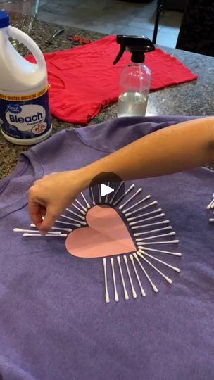 someone is making a t - shirt with sunbursts on it and glue