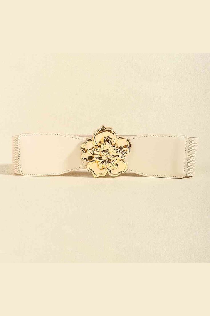 Experience the perfect blend of fashion and functionality with our Flower Alloy Buckle Elastic Belt. The trendy design of the flower alloy buckle adds a touch of elegance to any outfit, while the elastic belt provides a comfortable and adjustable fit. Look and feel your best with this must-have accessory! Material: alloy Imported Product measurements: Length: 28.7 in Width: 2.4 in Buckle: 3.1 in Adjustable Beige Belt For Spring, Beige Adjustable Belt For Spring, Spring Adjustable Beige Belt, Adjustable Gold Fabric Belt, Elegant Belt With Removable Buckle For Spring, Adjustable Belt For Formal Occasions In Spring, Adjustable Formal Belt For Spring, Elegant Spring Fabric Belt, Spring Formal Adjustable Belt