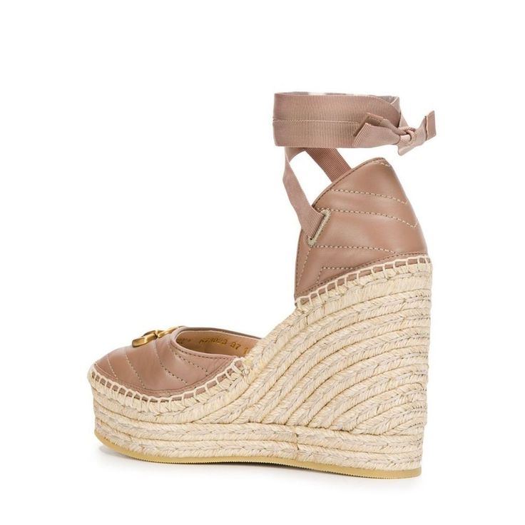 The Gucci collection is the pinnacle of Italian craftsmanship and attention to detail as seen in these dusty pink Leather platform espadrilles. Featuring an almond toe, a branded insole, a high wedge heel, a grosgrain lace-up closure and a gold-tone double G logo on the front.Lining: Leather 100%, Jute 100%Sole: Rubber 100%Outer: Leather 100% Gucci Platform Sandals With Ankle Strap, Leather Wedge Espadrilles With Heel Strap, Leather Espadrilles With Wedge Heel And Heel Strap, Chic High Heel Platform Espadrilles, Platform Heels With Ankle Strap, Luxury Spring Platform Espadrilles, Gucci Platform Heels With Round Toe, Beige Closed Toe Espadrille Heels, Chic Espadrille High Heels