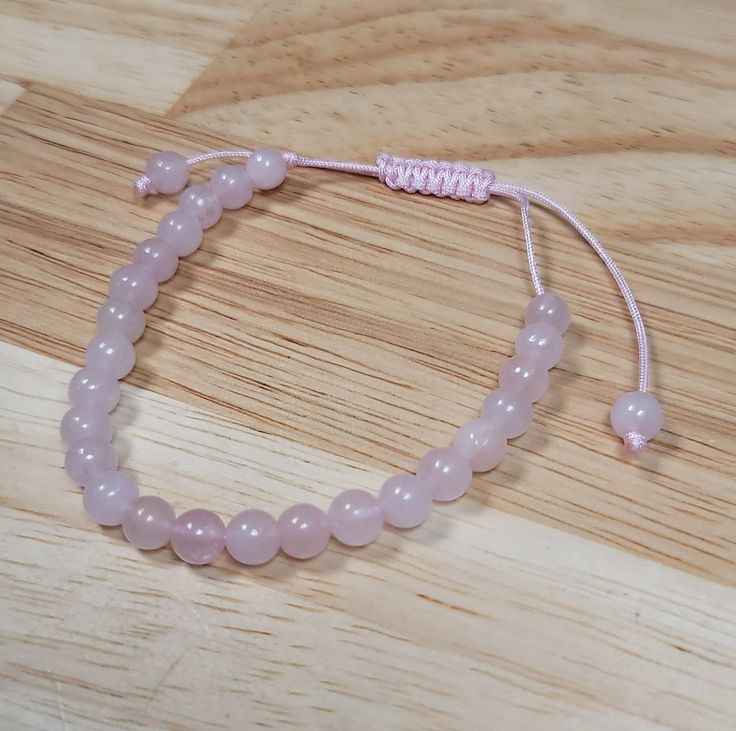 Adjustable Bracelet ( Rose Quartz ) Made with 6mm Rose Quartz Beads Adjustable Pink Rosary Bracelet With 8mm Beads, Adjustable Rose Quartz Jewelry In Rose Color, Adjustable Rose Quartz Rose-colored Jewelry, Adjustable Casual Rose Quartz Bracelets, Casual Adjustable Rose Quartz Bracelets, Adjustable Rose Gold Rosary Bracelet With Round Beads, Adjustable Rose Quartz Beaded Bracelet With Round Beads, White Swan, Rose Quartz Beads