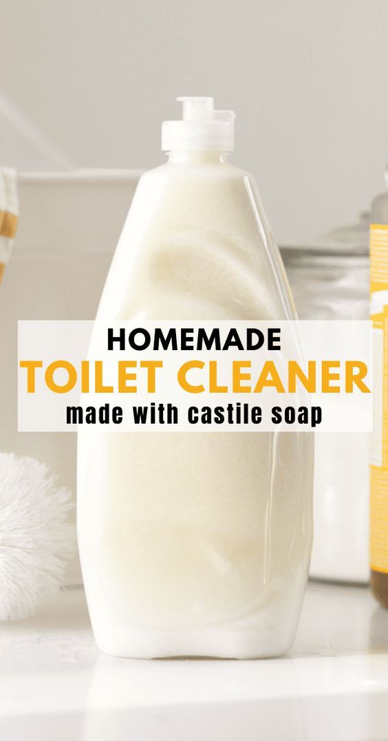 homemade toilet cleaner made with casteile soap on a counter next to other bathroom items