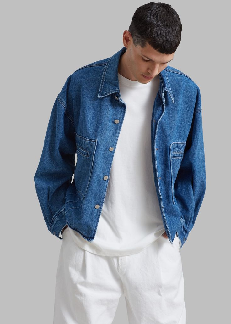 Color: Blue Midweight denim fabric Relaxed silhouette  Pointed collar  Drop shoulders Double front welt pockets Front button closure Unlined 100% Cotton  Hand Wash Cold or Dry Clean Imported One Size Denim Fabric, Welt Pockets, Welt Pocket, Drop Shoulder, Denim Jacket, Color Blue, Dry Clean, Hand Wash, Collar