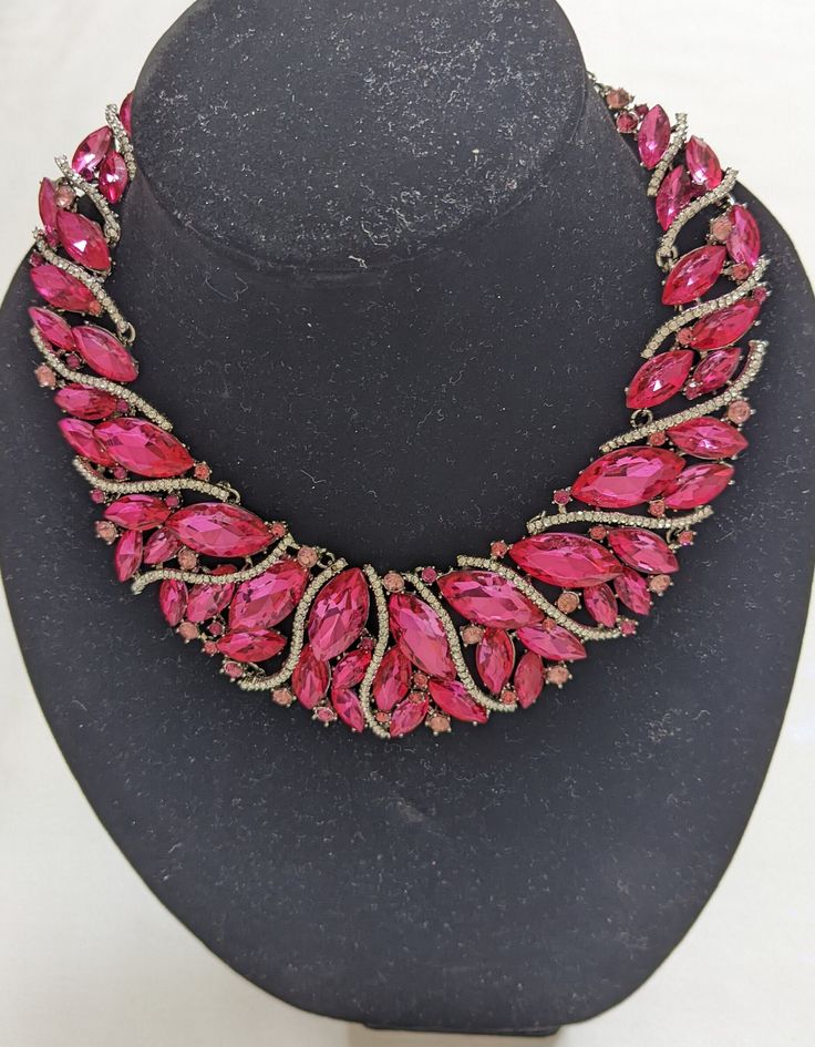 A B Pink/white Austrian Crystal Rhinestone Choker Necklace Large Necklace, Pageant/Prom Jewelry, Bridal Wedding Necklace, Pink Stage Jewelry This item is in excellent condition, there are all stones and crystals present. The chain has a silver tone made of alloy  or stainless steel. Lobster clasp closure. There are option for making it smaller by the neck base or longer .  There is a metallic, silver tone tag , however I could not understand if there is a mark or just some letters.  Brilliant pi Rhinestone Choker Necklace, Large Necklace, Prom Jewelry, Rhinestone Choker, White Crystals, Jewelry Bridal, Austrian Crystal, Wedding Necklace, Bridal Wedding